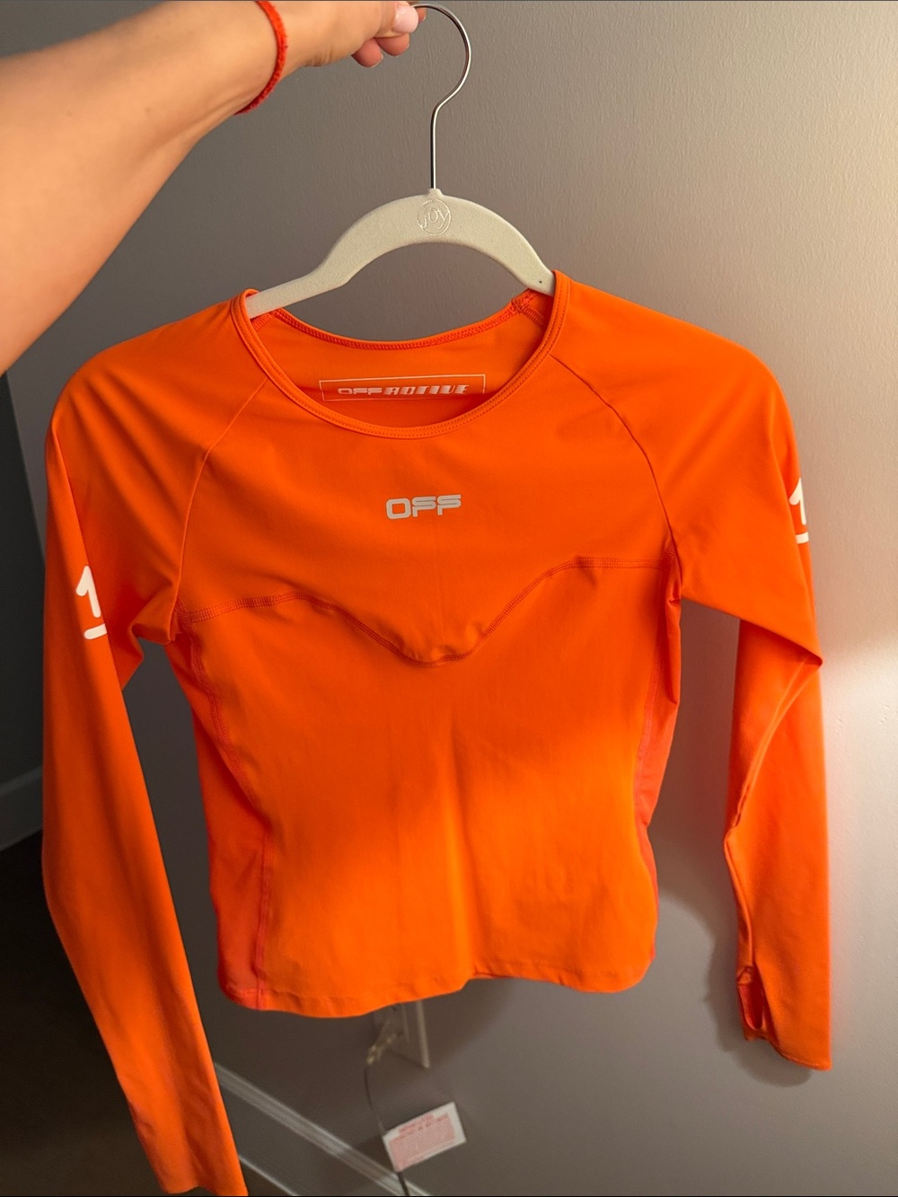 Off-White Women's Long Sleeve Performance Top in Bright Orange
